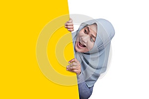 Muslim Woman Smiling Behind Blank White Board