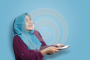 Muslim Woman Surprised to See Something Above when using Phone