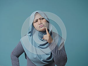 Muslim Woman Thinking Something