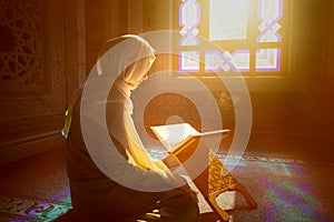 Muslim woman under the sunlight