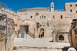 A Muslim woman walking out of the complex  the Coptic Orthodox Patriarchate  The 9th station of the cross in Via Dolorosa at the