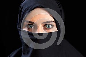 Muslim woman wearing the face veil