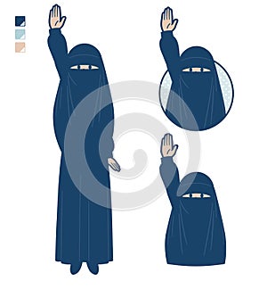 A muslim woman wearing a niqab with raise hand images