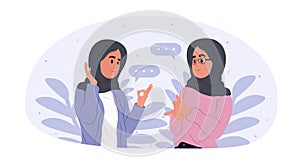 Muslim women communicate in sign language.