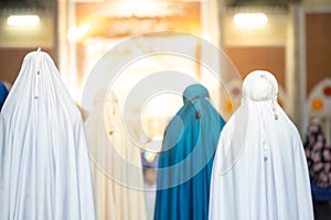 Muslim women tarawih prayer  background blur,1443 Puasa Ramadan festival concept, Concept person Dua Coran religious devout ,Women