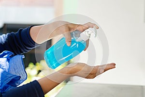 Muslim women wash hand with soap alcohol gel for sanitizer in kitchen sink concept for prevent Hygiene health care. Quarantine