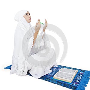 Muslim worshiper praying on the GOD