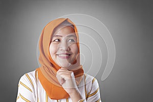 Muslimah Businesswoman Thinking Something, Having Bright Idea