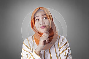 Muslimah Businesswoman Thinking Something, Having Bright Idea