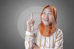 Muslimah Businesswoman Thinking Something, Having Bright Idea