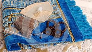 While muslims come from Hajj, they bring dates, prayer rugs and rosaries as a gift