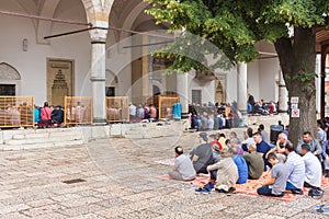 Muslims praying in the Old Town Mosque of Sarajevo, Bosnia .