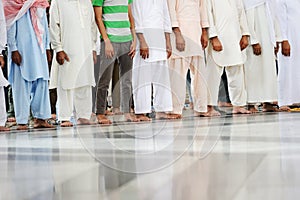 Muslims praying together at Holy mosque photo
