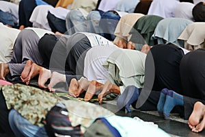 Muslims praying together at Holy mosque photo
