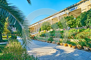 Mussala Gardens` entrance through the palm branch, Shiraz, Iran