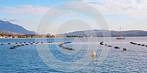 Mussel farm. Cultivation of mussels, rope culture. Beautiful Mediterranean landscape. Montenegro, Kotor Bay