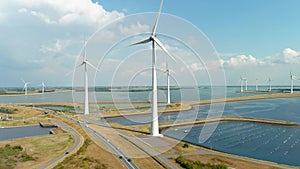 Mussel farm, wind turbines and highway