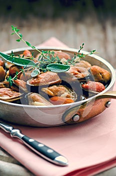 Mussels in cream and garlic sauce with provencal herbs