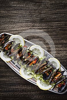 Mussels in fresh zesty marinated citrus vegetable sauce seafood