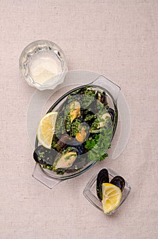 Mussels with green sauce photo