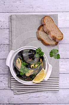 Mussels with green sauce photo