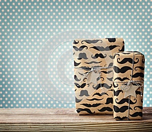 Mustache pattered gift boxes with star shaped tags