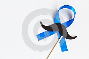 Mustache pattern with blue ribbon symbol. Movember concept.