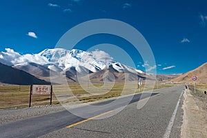 Mustagh Ata Mountain at Karakul Lake in Pamir Mountains, Akto County, Kizilsu Kirghiz Autonomous Prefecture, Xinjiang, China.