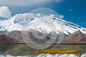 Mustagh Ata Mountain at Karakul Lake in Pamir Mountains, Akto County,Kizilsu Kirghiz Autonomous Prefecture, Xinjiang, China.