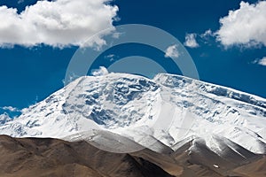 Mustagh Ata Mountain view from Karakul Lake in Pamir Mountains, Akto County, Kizilsu Kirghiz, Xinjiang, China.