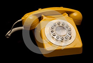 Mustard retro style telephone