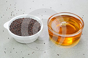 Mustard seed oil in a cup
