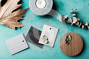 Muted wood and laminte swatches flat lay