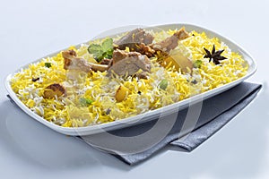 Mutton biryani , Gosht or lamb biryani or Hyderabadi Dum biriyani with raita yoghurt dip special occasion festival food for