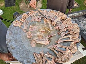 mutton chops on the frying pan,mutton chops fried in hot oil