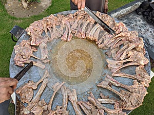 mutton chops on the frying pan,mutton chops fried in hot oil