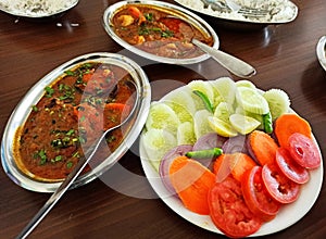 Mutton curry with salad, traditional bengali lunch items