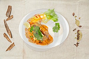 Mutton Rara gosth with plain rice, salad and lime served in a dish isolated on table top view of indian spices food