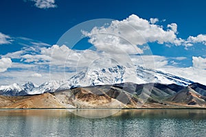 Muztagh Peak and Karakul Lake in Xinjiang, China