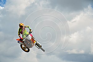 MX rider on a motorcycle in the air