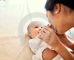 My baby, my blessing. a happy mother bonding with her baby boy at home.