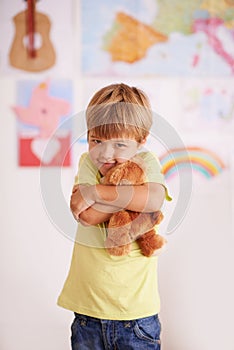 My bear bestie. Portrait of a cute little boy hugging his teddybear.