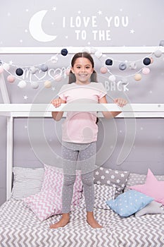 My bedroom my rules. Cute cozy bedroom for small girl. Girl relaxing bedroom interior. Childhood concept. Bedroom relax