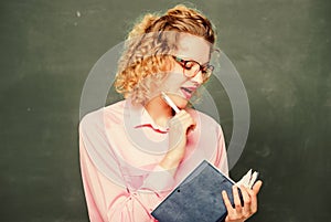 This is my book. new school year. Girl prepare for exams. happy student in glasses at blackboard. report project. back