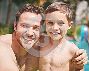 My champion swimmer. Cropped portrait of a handsome young man and his son swimming outside.