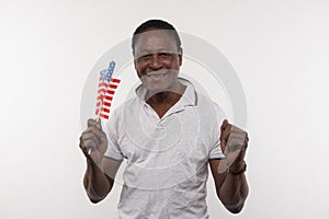 Happy Afro American man expressing his patriotic feelings