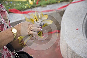 My family prepare and folding joss paper or money paper for burn