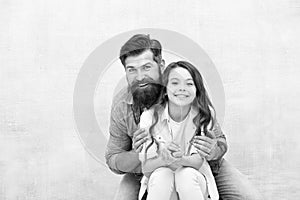 In my father I trust. Happy father giving little daughter trusting support. Bearded man and small girl child sharing