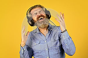 my favorite song. enjoy excellent sound song in earphones. good mood playlist. Man with headset. bearded man hipster in