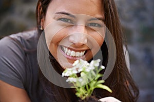 My favourite annual. Close up shot of a young woman holding up an Assylum plant.